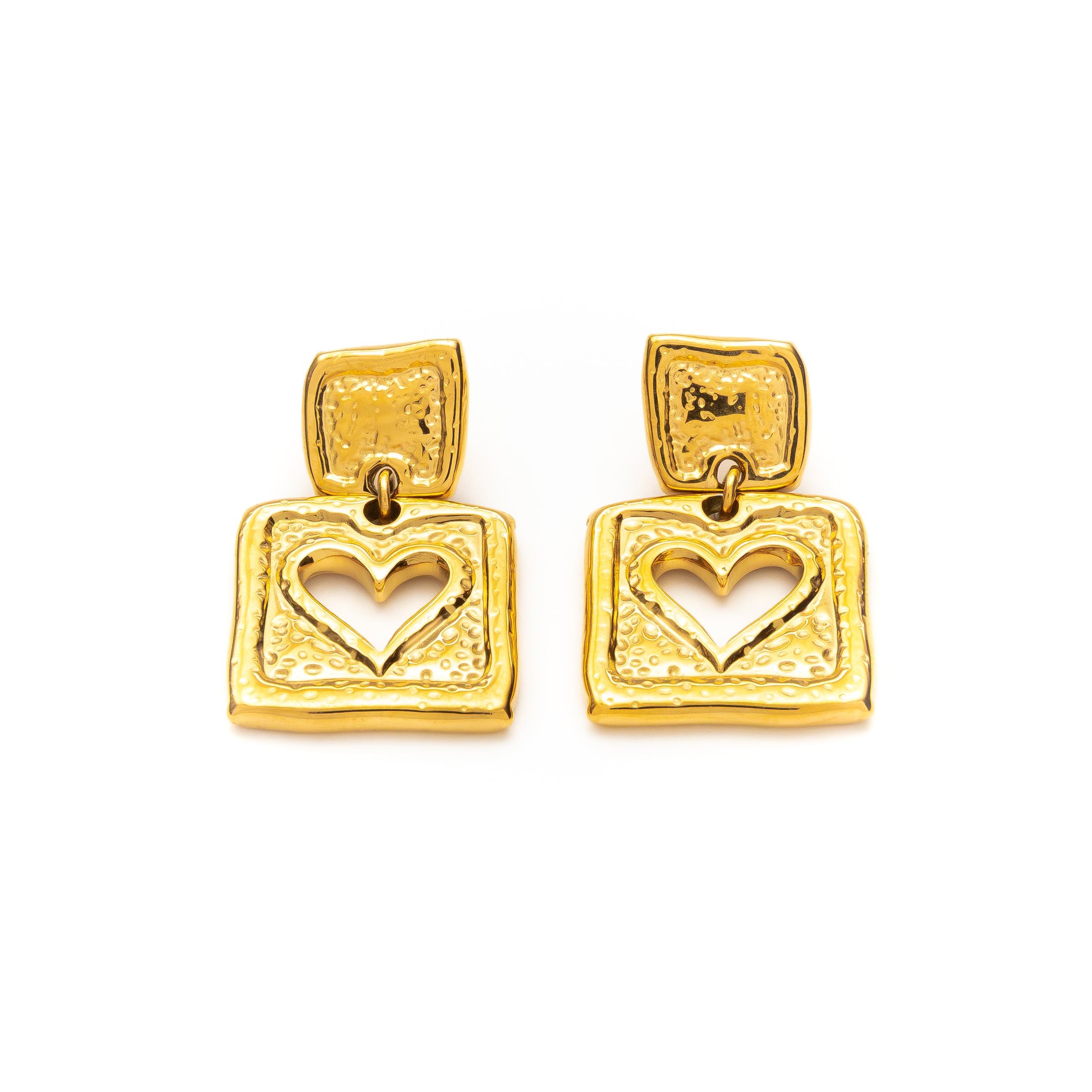 Gold earrings with square design and heart cutout on a white background